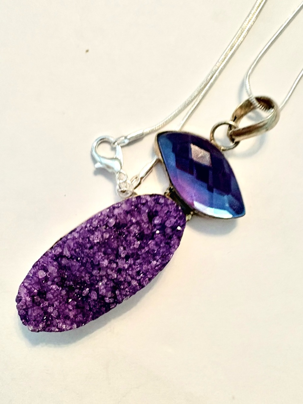 , 2 1/2 inch, Titanium Druzy and Mystic Topaz pendant in a silver chain.